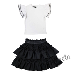 Комплект за момиче от детска пола в черно с и блуза в бяло с черни къдрици