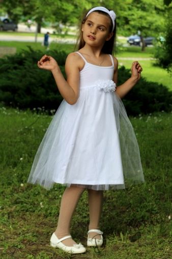 Summer children's dress in ywhite with tulle