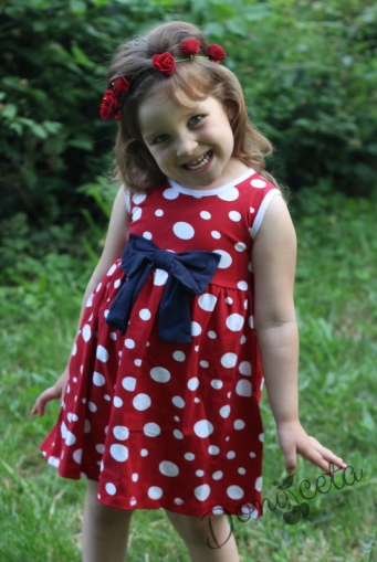 Summer children's dress in red with white dots