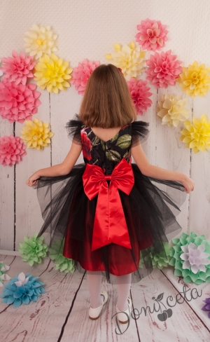 Официална детска  рокля Глория в  черно и цветя с голяма червена панделка отзад