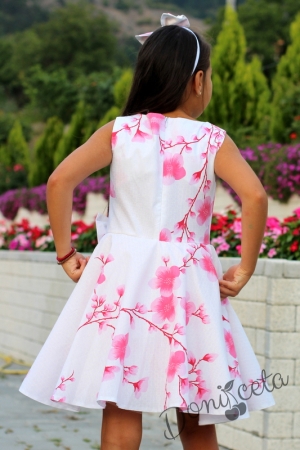 Официална детска рокля в бяло на цветя/орхидеи в прасковено тип клош Патриция 9
