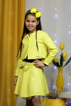 Детска кожена пола Мелания в жълто за момиче с панделка отпред