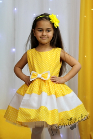 Официална детска рокля в жълто на бели точки с тюл 