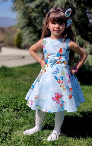 Детска рокля в тюркоаз на пеперуди тип клош с болеро в бяло 3