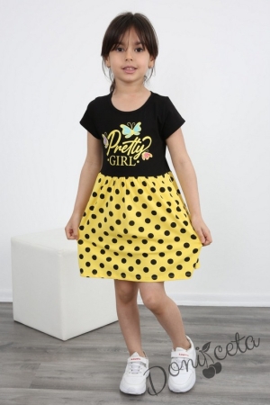 Ежедневна детска рокля с къс ръкав в черно и жълто на точки