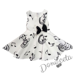 Официална детска/бебешка рокля в бяло с ноти в черно тип клош Симона  1