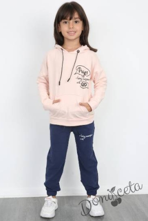 Kids sports set for girl made of sweatshirt in powder and trousers in dark blue