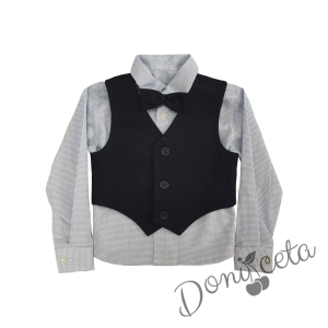Официален костюм момче от елек в тъмносиньо, риза в бяло на квадрати, панталон и папийонка 74547887 1