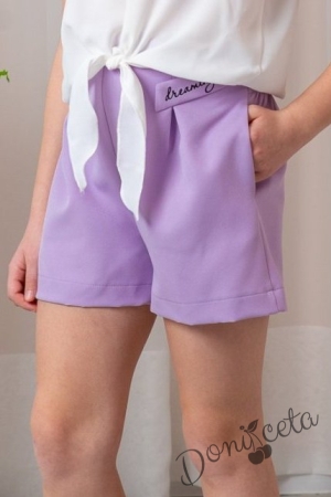 Летен детски комплект за момиче от туника с цветя и къс ръкав и къси панталони Contrast в лилаво с емблема 3