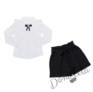 Комплект от блуза в бяло с дълъг ръкав и къдрици с брошка и къси панталони в черно