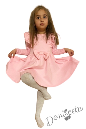 Детска рокля в пудра с дълъг ръкав с панделка