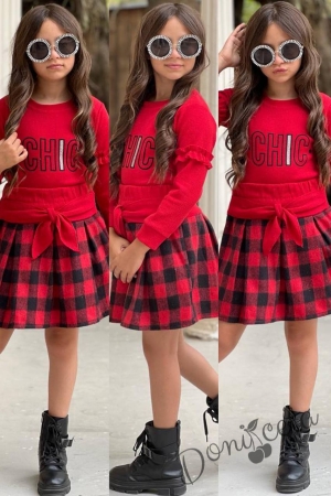 Детски комплект за момиче от карирана пола в червено и черно и блуза с дълъг ефектен ръкав и ластик в червено 1