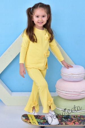 Комплект за момиче от 2 части в жълто с панделки 1