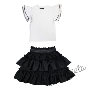 Комплект за момиче от детска пола в черно с и блуза в бяло с черни къдрици 1